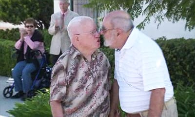 The couple's first kiss as newlyweds