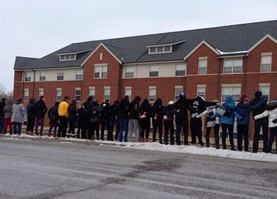 students_block_michael_sam_gay_hate_church_protest