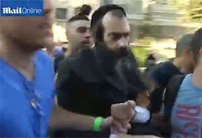 Yishai Shlissel is arrested by police (Image: Daily Mail – see below)