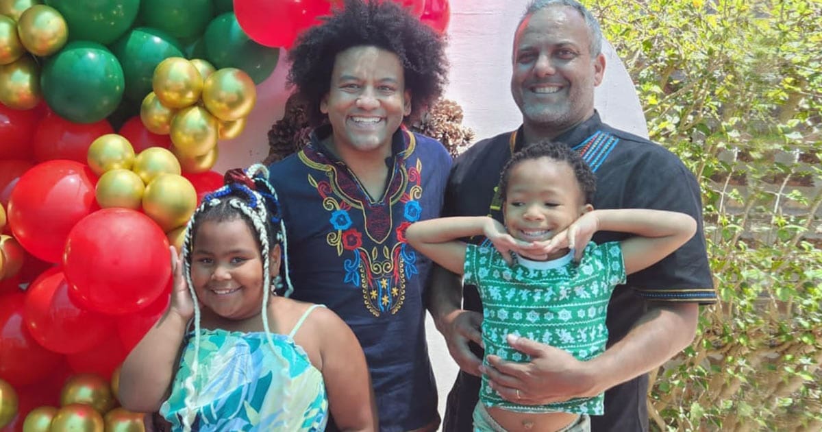 Gay dads Jade Hearne and Garth Shaun with Taylor-Jane and Inathi