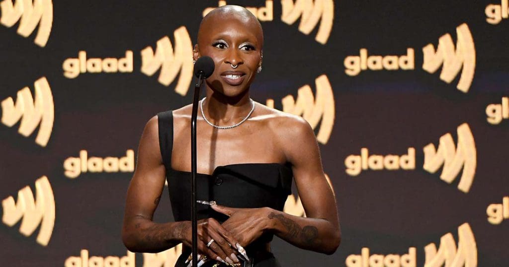 An image of Cynthia Erivo accepting her award on stage at the GLAAD Media Awards